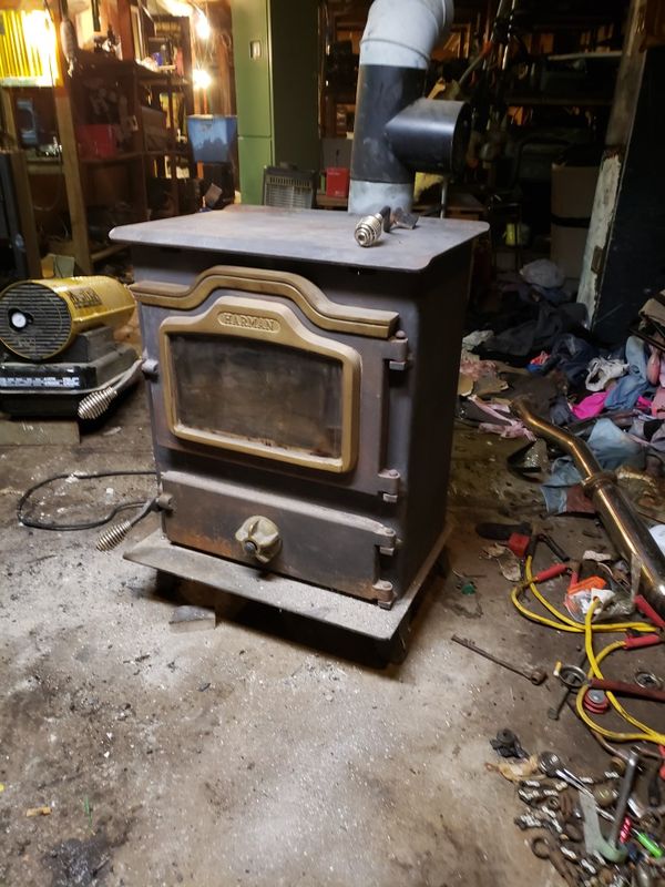 Harman mark 2 coal/wood stove has new fire bricks, door 