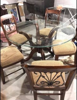 54 inch Solid Glass Table With 6 Chairs- Great condition  