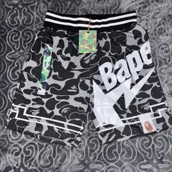 BAPE shorts featuring a gray camouflage pattern