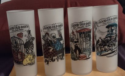 A SET FOUR 10 Oz  GLASSES WITH ANTIQUE PICTURES
