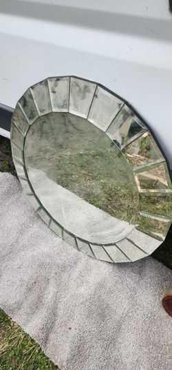 Venetian-inspired mirrored frame. 