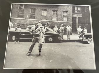 Framed photo of Willie Mays playing stick ball