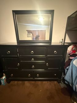 Black dresser with mirror
