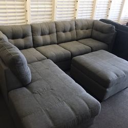 Grey Couch, Still In Plastic