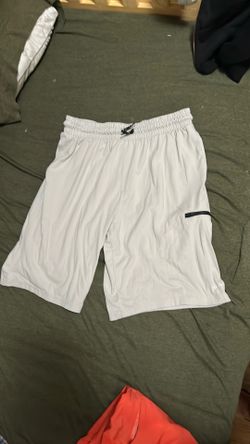 Grey shorts. Medium