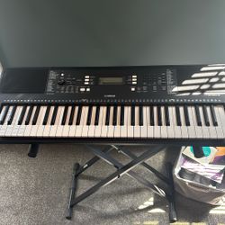 Yamaha Piano + Stand (needs Power cord)
