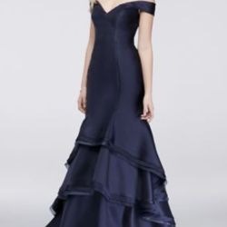 XSCAPE David’s Bridal Tiered Off-the-Shoulder Satin Mermaid Gown in Navy Blue.  