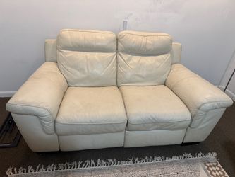 Two Leather Sofa Recliners + Ottoman