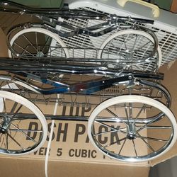 Silver Cross pram or stroller, a British brand known for its high-quality and iconic baby carriages. 