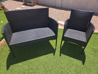 Outdoor Rattan Sofa Seat and Chair Dark Brown Plastic Wicker Outside Seating. Only flaws are the right arms have sun damage and some of the plastic wi