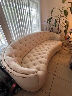 Cream color tufted couch