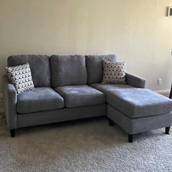Living Spaces Light Gray 80" Sectional Sofa with Reversible Chaise