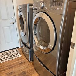 LG Front Load Washer & Dryer Set with Pedestals – Steam, Stainless Steel