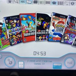 NINTENDO WII Including 33 GAMES MARIO KART,MARIO PARTY,WII SPORTS,ZELDA and More