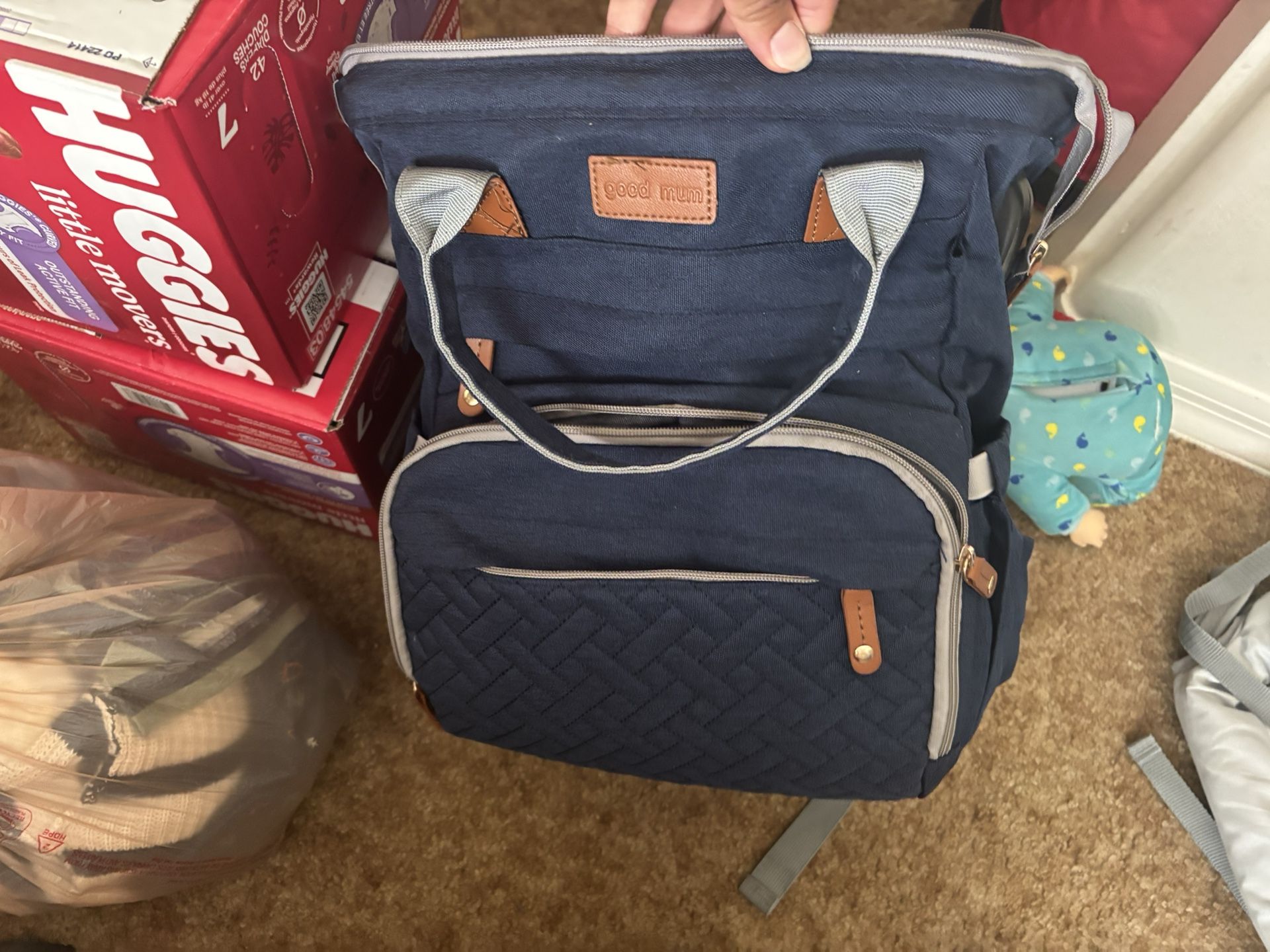 Diaper Bag And Baby Clothes