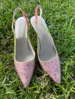 Sparkling Karl Lagerfeld slingback heels Women’s Size 9.5 with a pointed toe and 4” stiletto heel. Preowned in good condition Pet & Smoke Free Home.