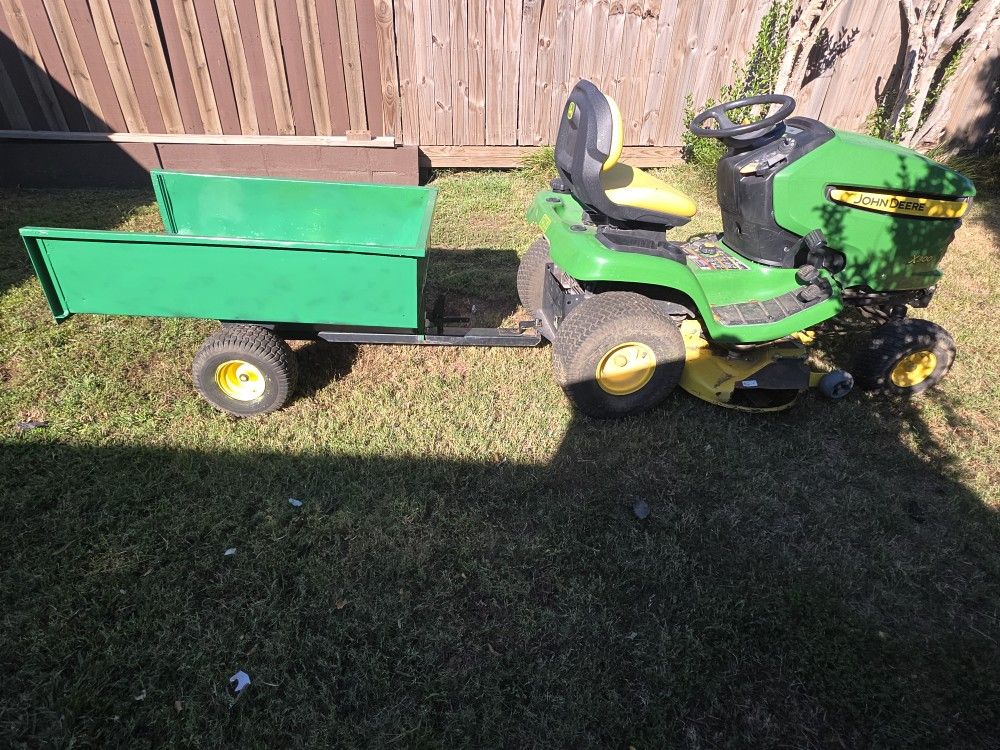 Jonh Deere X300 With Small Trailer