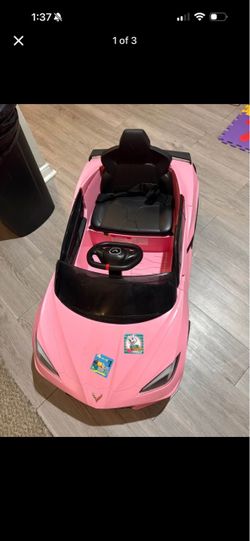 Pink corvette powered ride on wheels