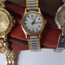 B: Timex Women's Quartz Gold and Silver Tone Watch