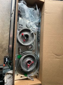 Garage door mounting hardware kit