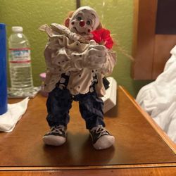 Cast Art Vintage 1993 clowns holding flowers, signed by Kristin
