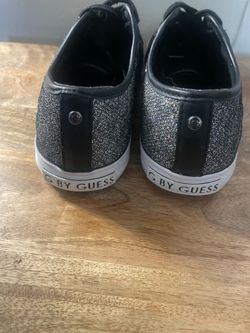 Guess sparkly canvas lace-up sneakers feature a prominent "G by GUESS" logo embossed