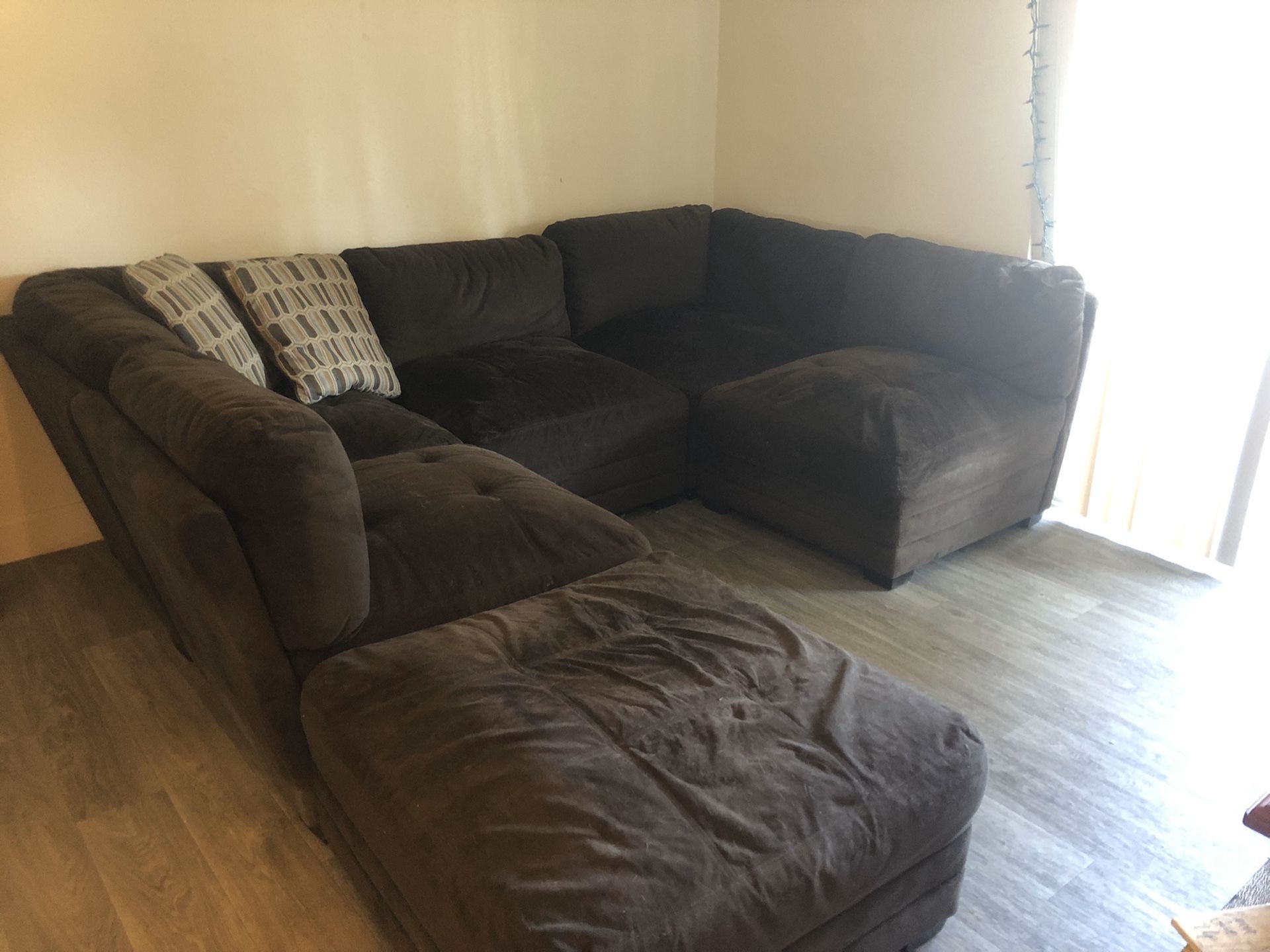 Dark brown sectional couch