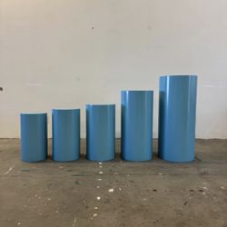 5 Blue Metal Cylinder cake plinths for events