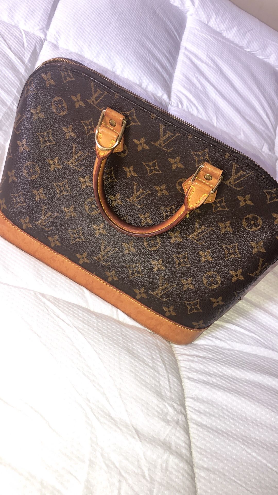 Louis Vuitton Alma Bag