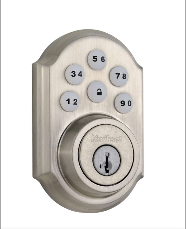 Quickset smart codedoor locksz wave in brass and brushed nickel for
