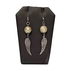 Handcrafted Silver Angel Wing Dangle Earrings with Cream Beaded Detail.
