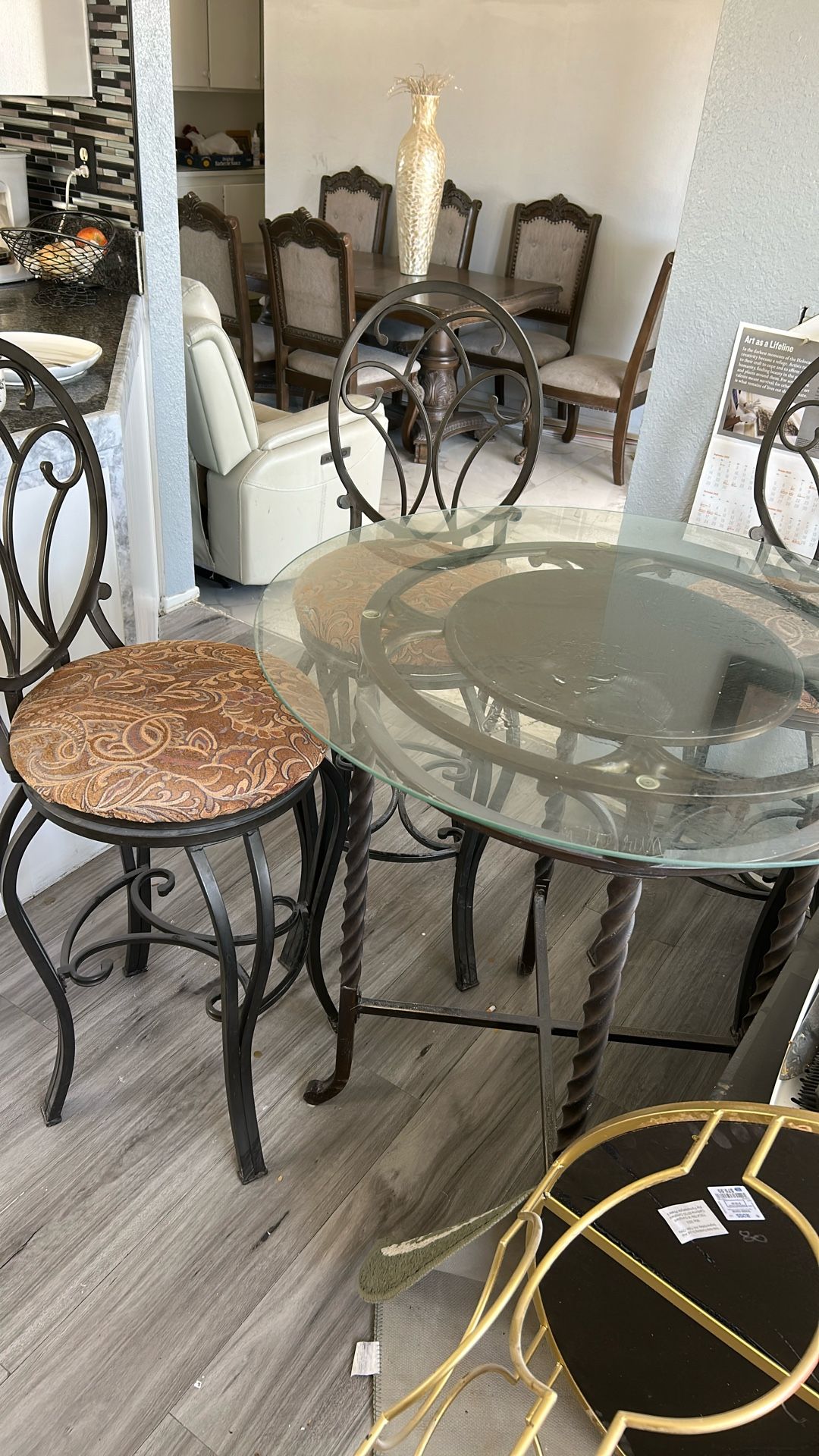 Glass round table with three chairs