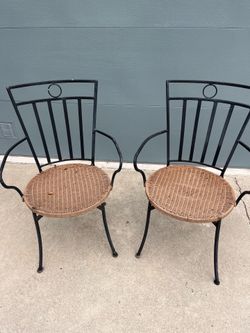 Pair of wrought iron chairs