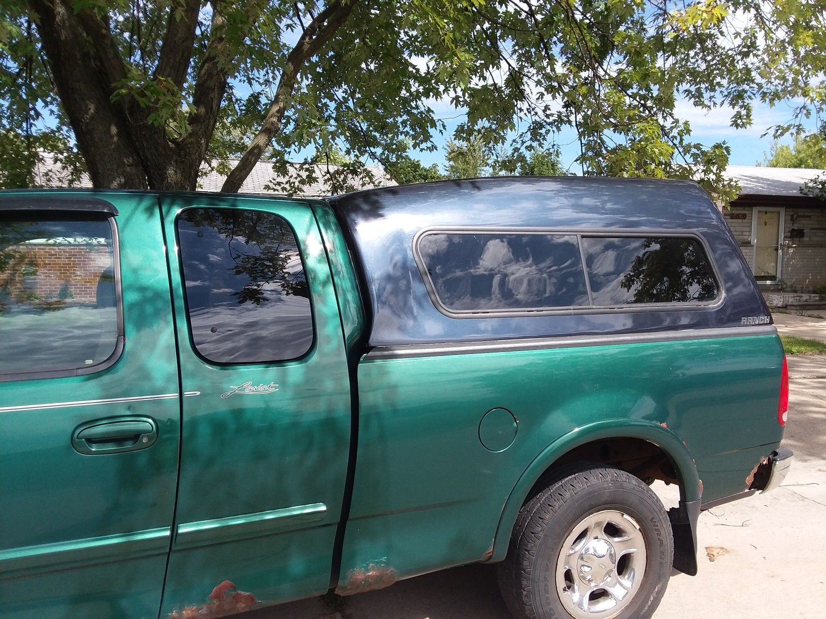 Camper shell truck cap