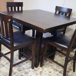 Dinning Table with Leaf by Ashleys