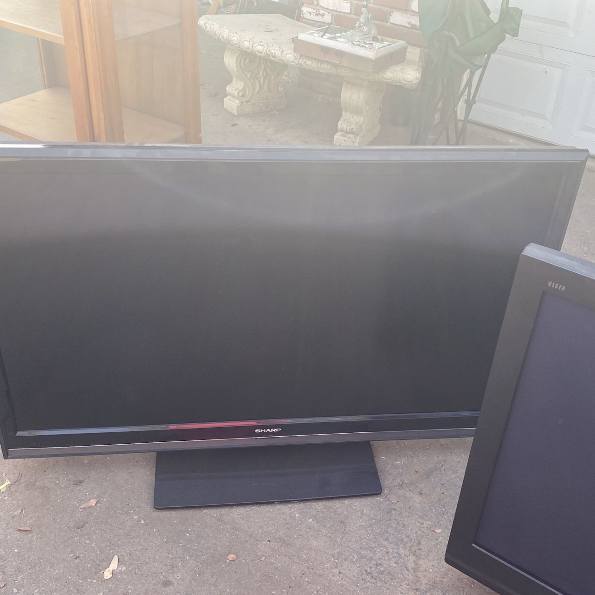 Two T.V. (sharp & Panasonic $50