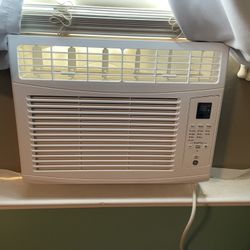 GE window ac air conditioner conditioning unit with remote and external cover