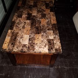 $100.00 OBO Coffee Table and two end tables.