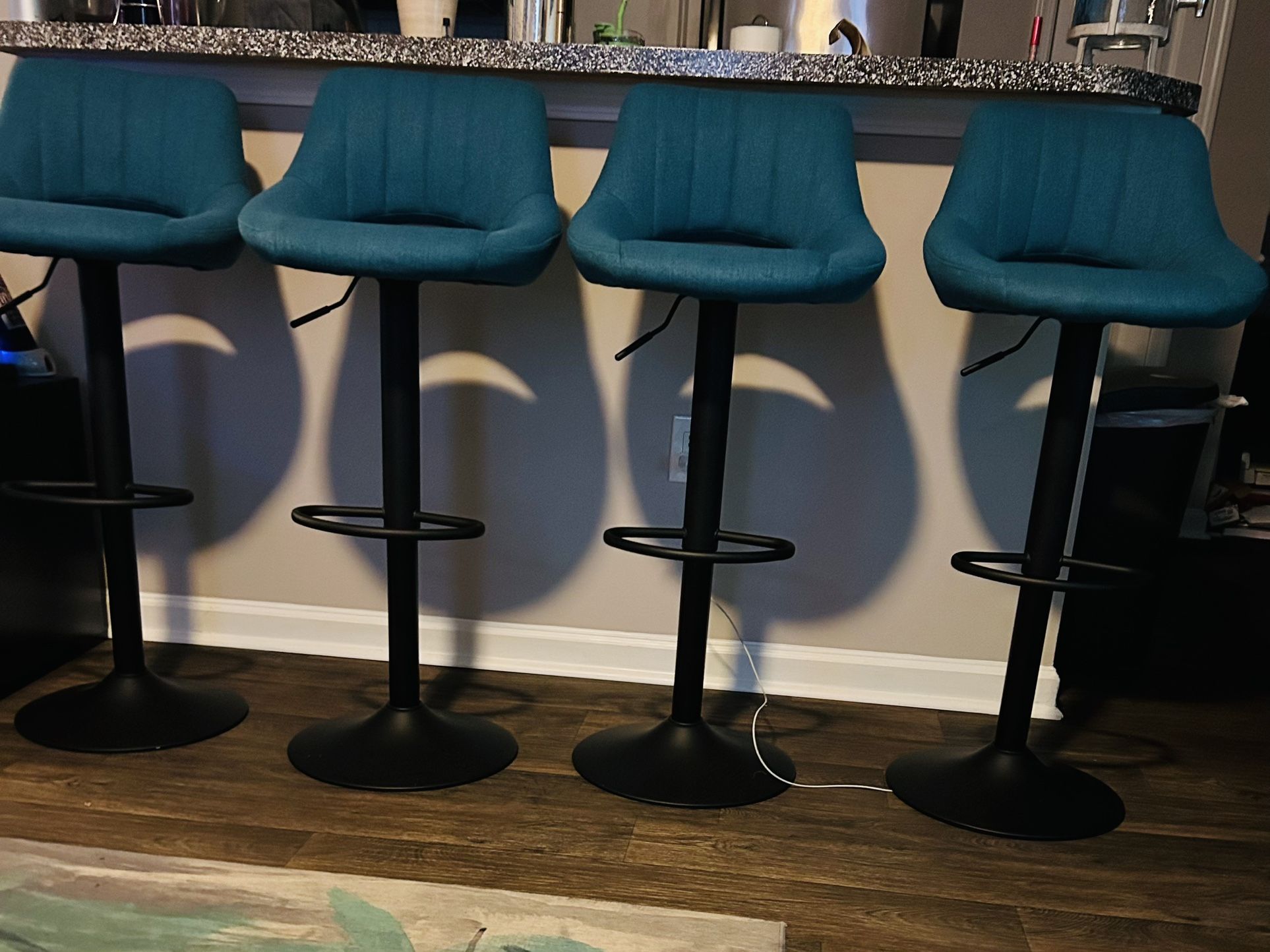 Teal adjustable & swivel Barstools set of 4