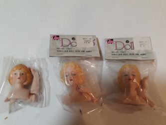 Vintage porcelain doll heads and arms