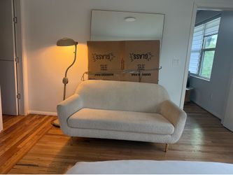 Article Gabriola 64” Creme off-white bouclé love seat with gold legs