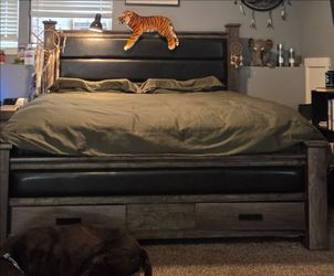 Rustic bed frame and mattress with night stand