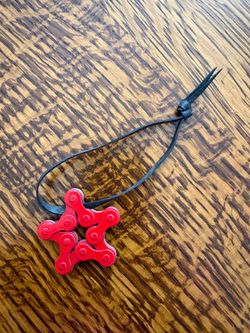 Bike chain star ornament, red