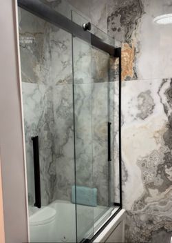 Sterling Enclave Frameless Sliding Tub/Shower Door- Matte Black