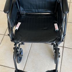 Foldable Wheelchair With Removable Foot Rest And Cushions. 
