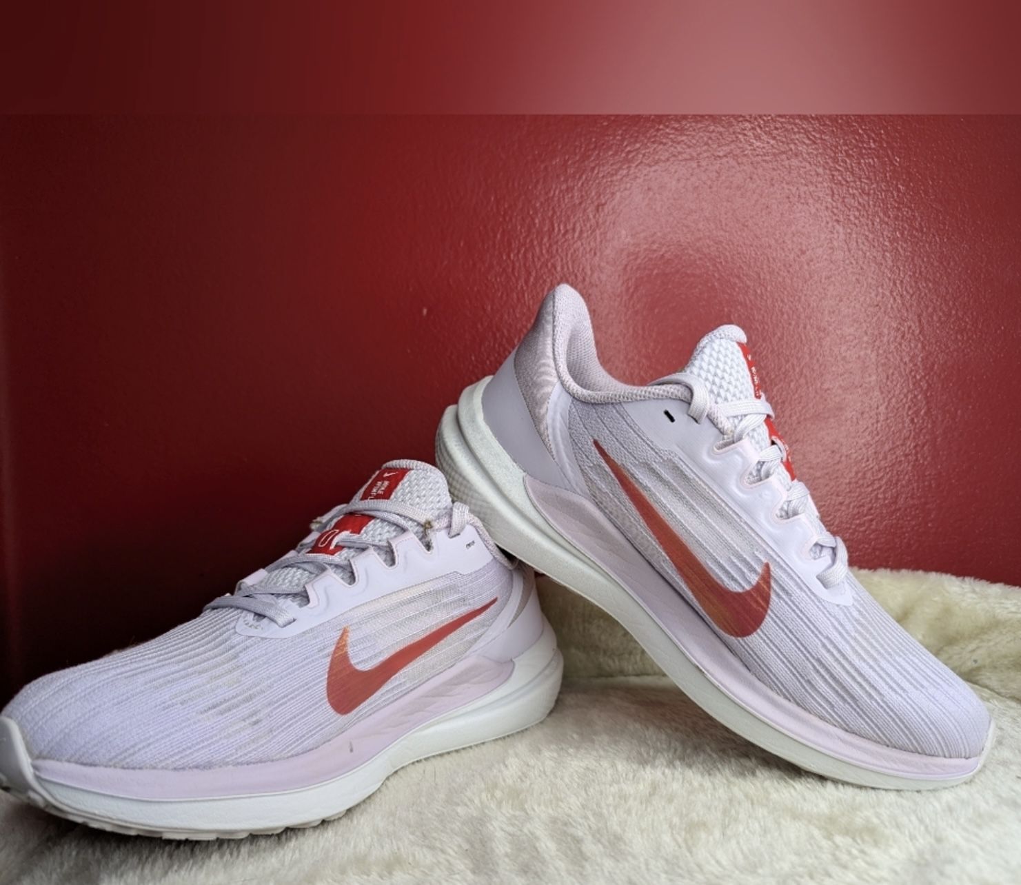Nike Zoom Vomero 16 in white and red #running