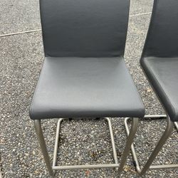 Two Leather Stools 