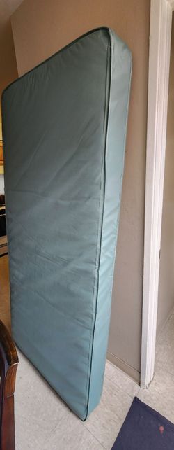Free New Twin size spring mattress,  vynil cover.