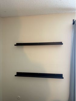 2 floating black shelves ikea Mosslanda