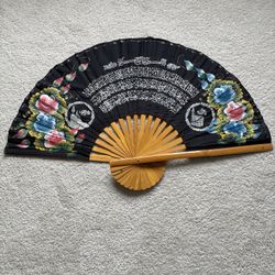 Decorative Folding Fan with Floral Design and Arabic Script